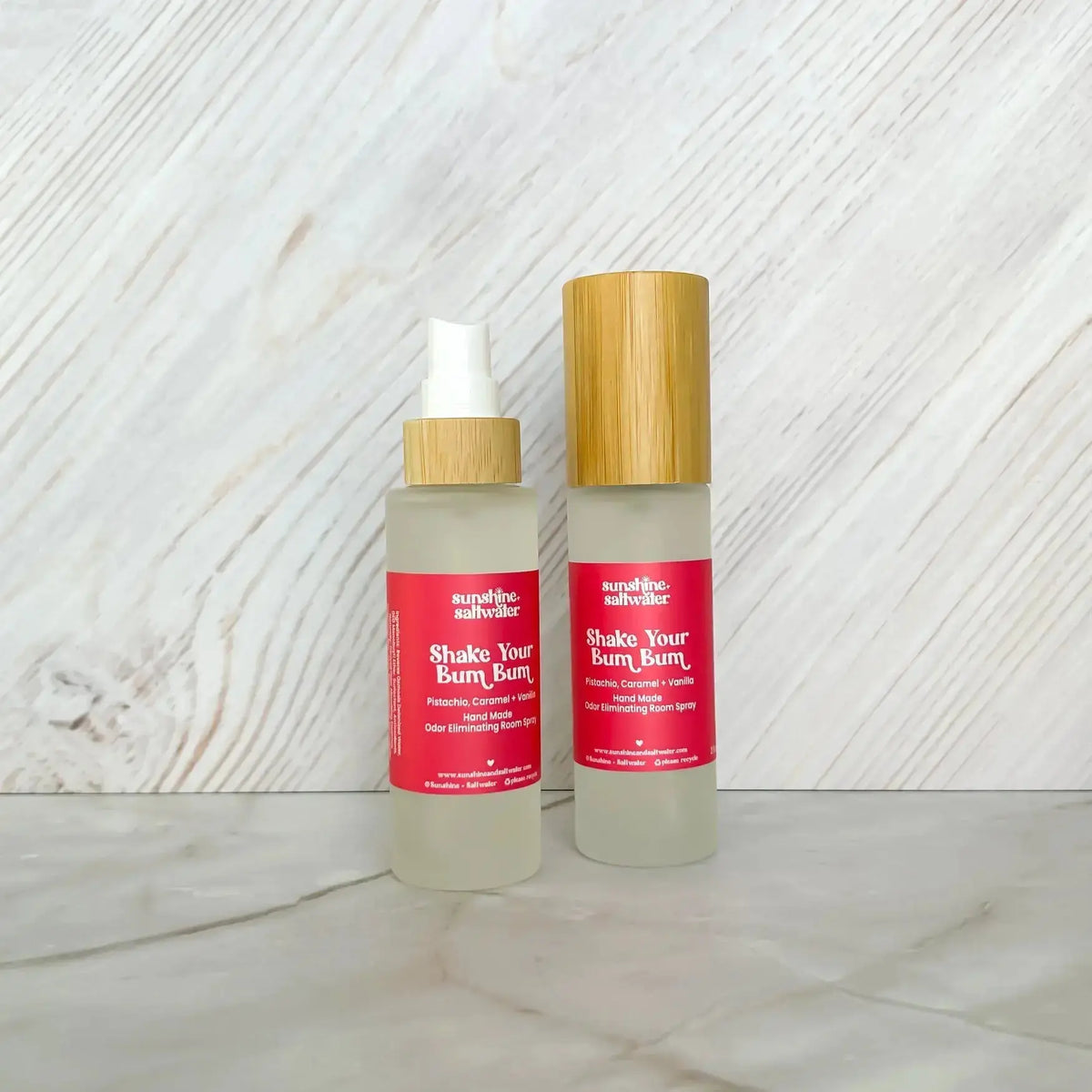 display of 2 Brazilian room spray bottles featuring the shake your bum bum scent with vanilla and pistachio