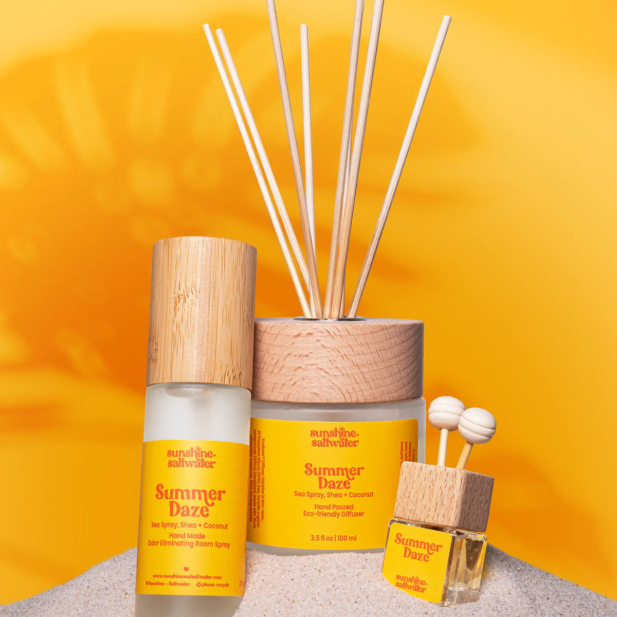 Three fragrance products in the Summer Daze scent, including a reed diffuser , room spray and car diffuser