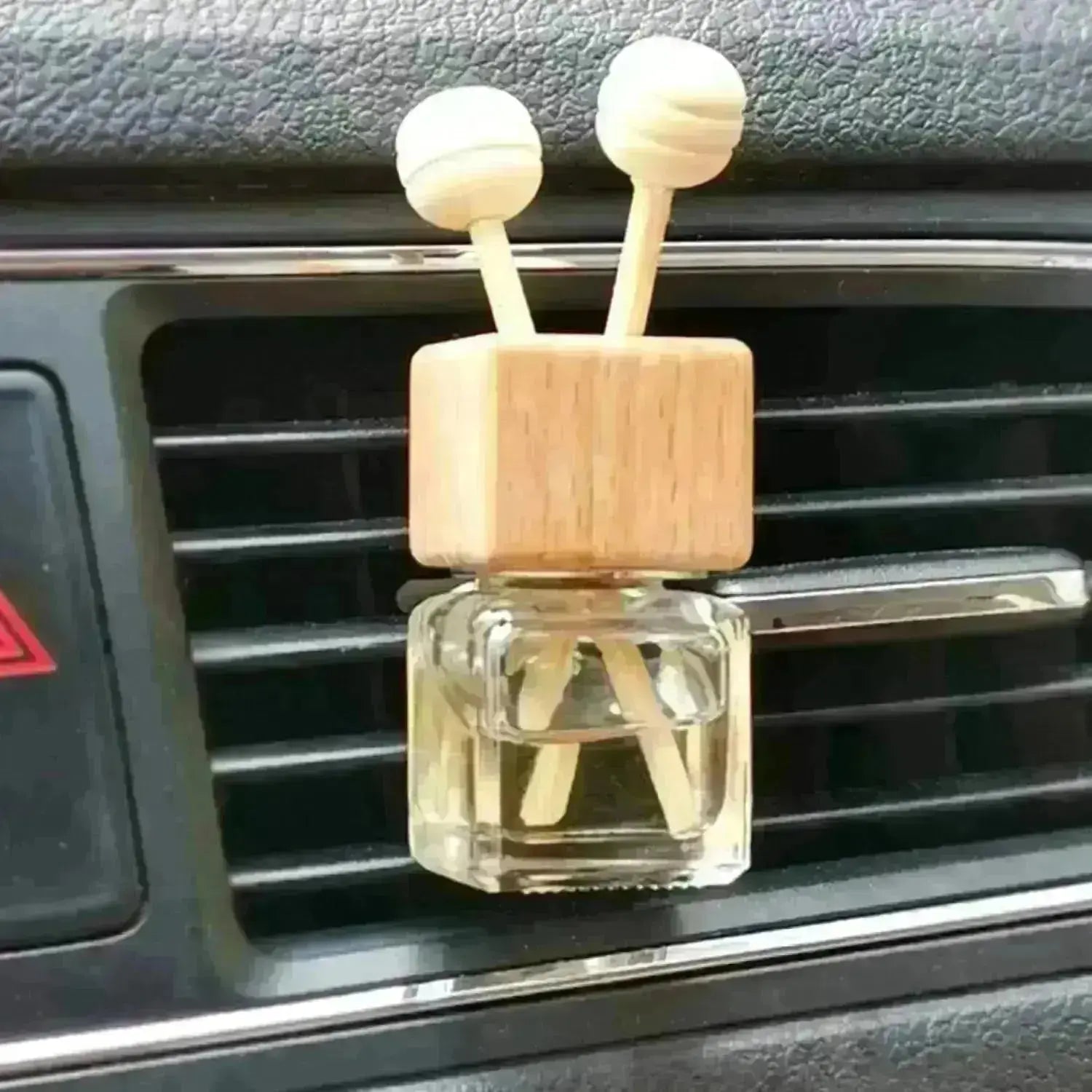 Tan Lines coconut and sunwashed woods car vent diffuser by Sunshine + Saltwater