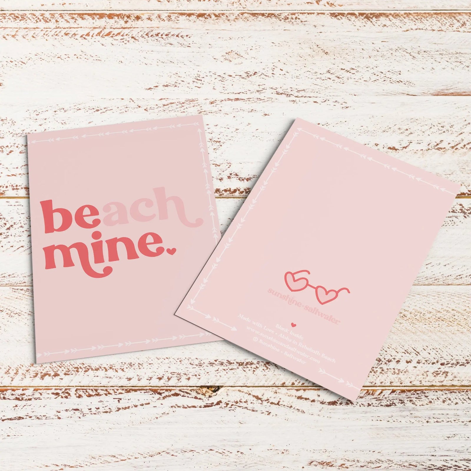 flat lay of beach mine valentine greeting card with kraft paper envelope