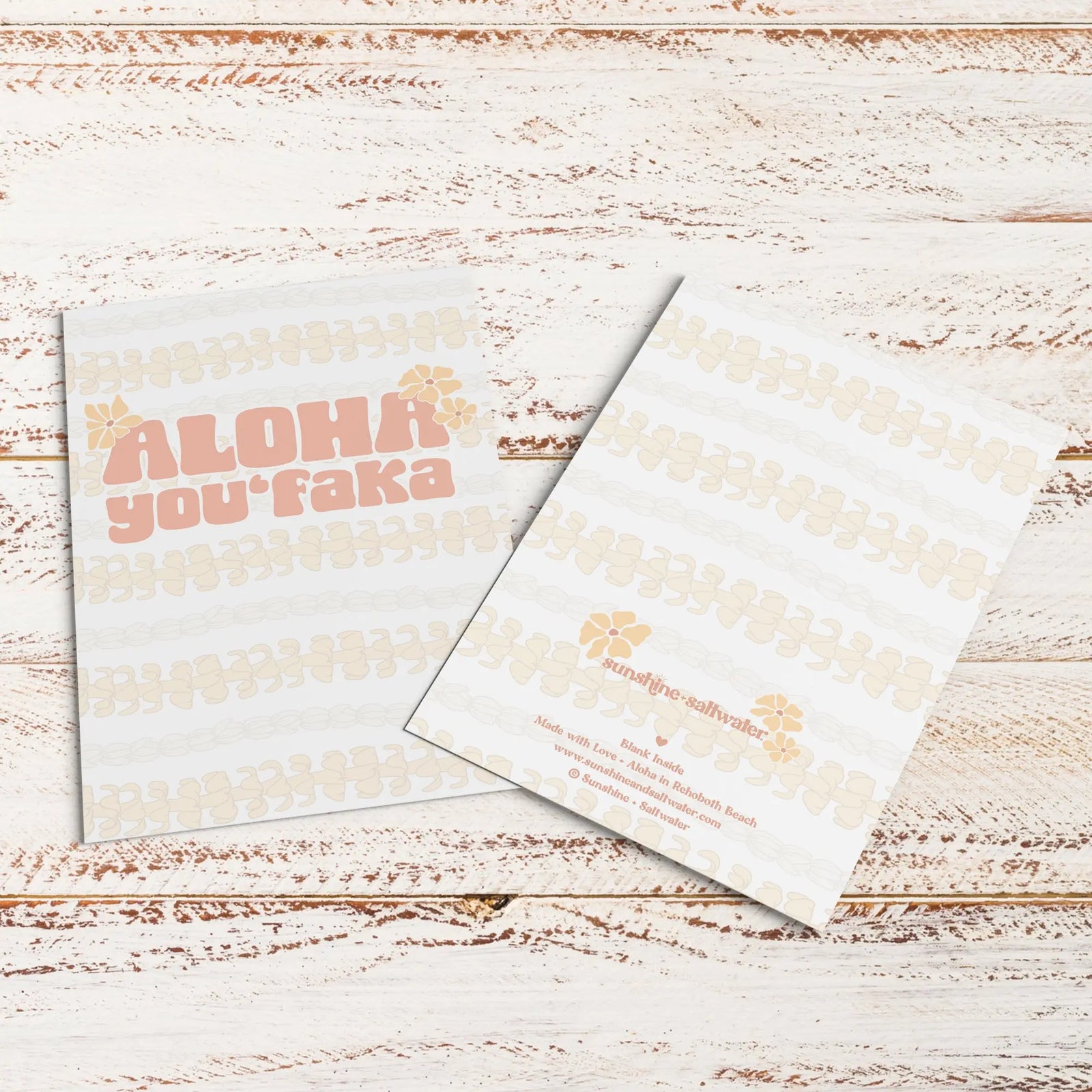flat lay of aloha you'faka greeting card with kraft paper envelope