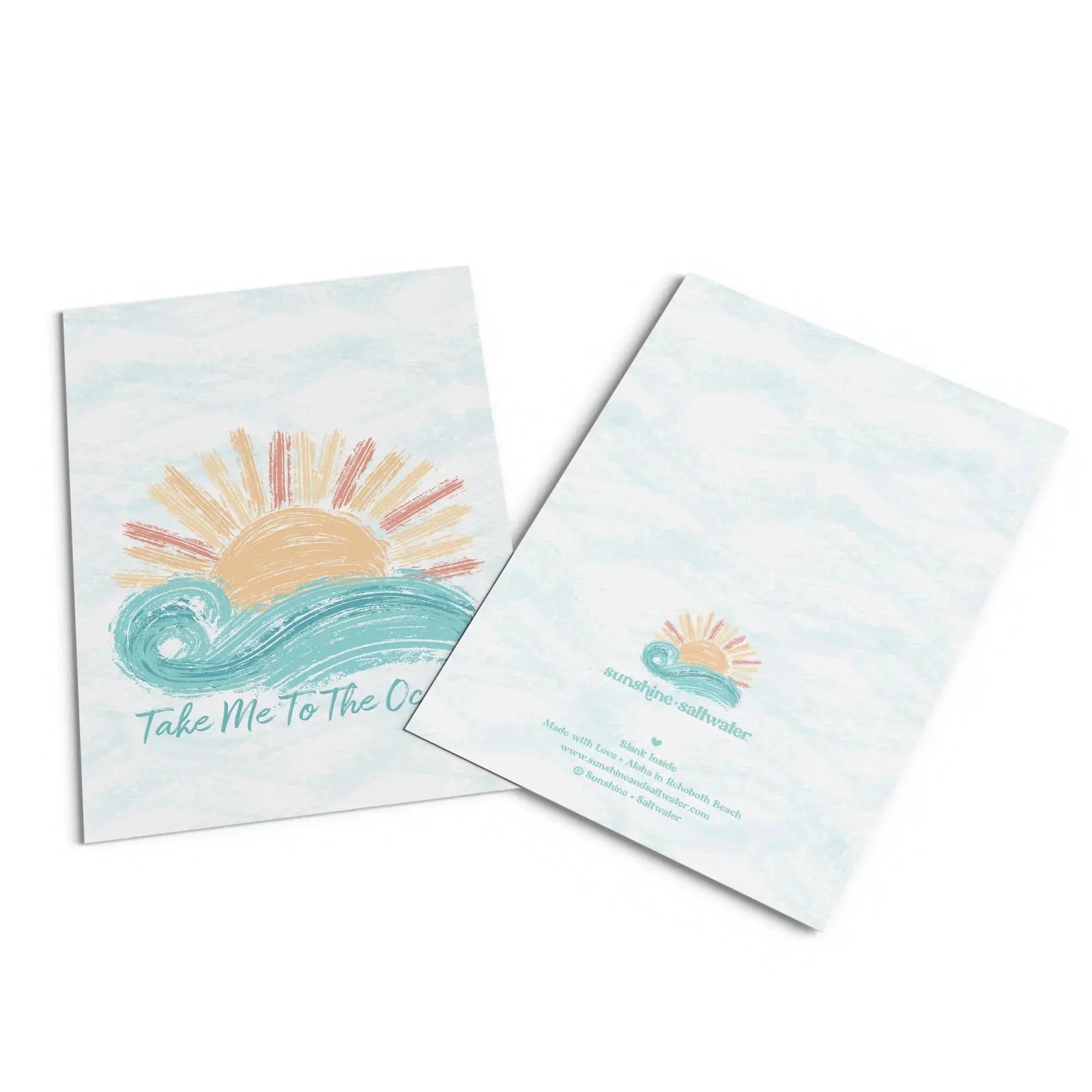 flat lay of beach themed stationary cards