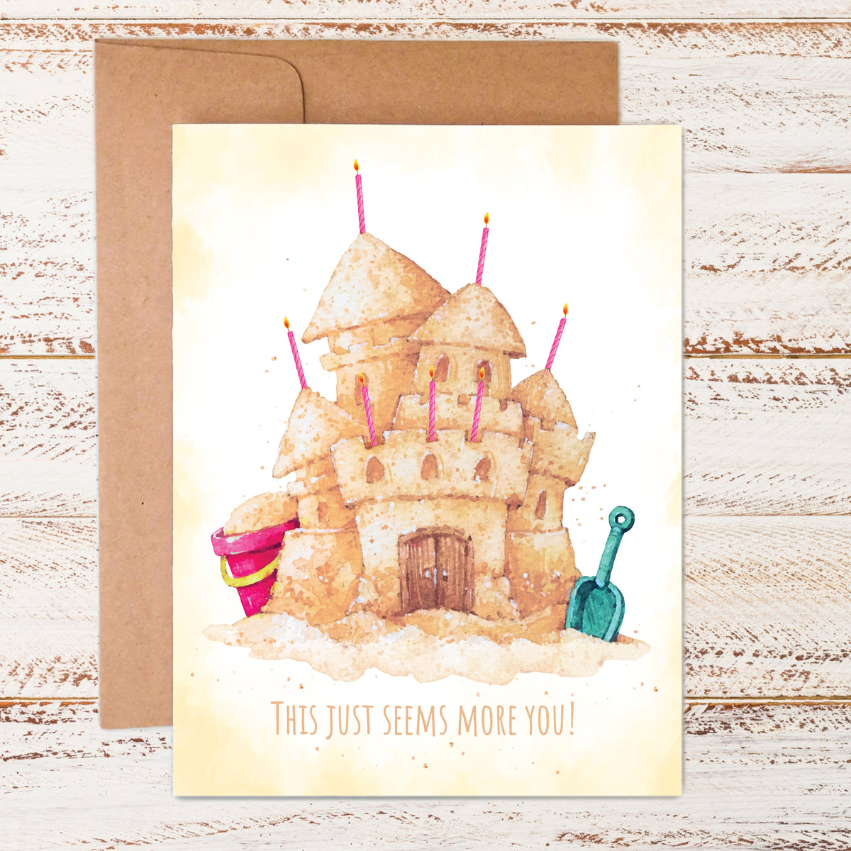 card with sandcastle and text that says this just seems more you