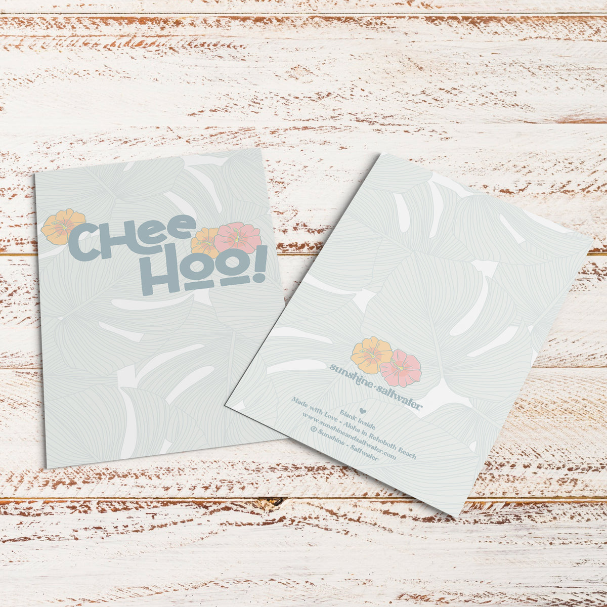 flat lay displaying front and back of chee hoo hawaiian greeting card