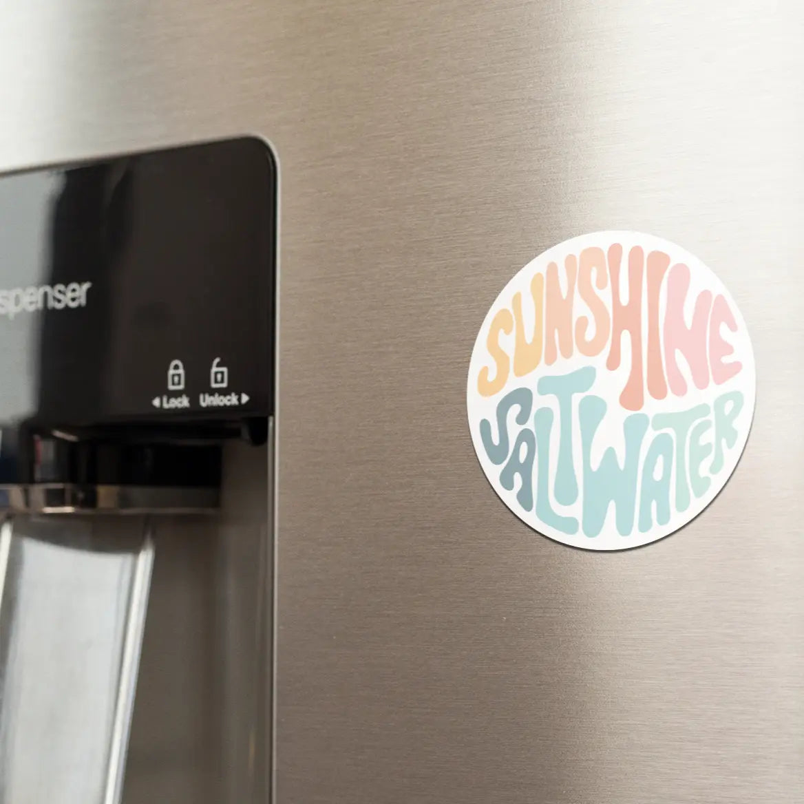 sunshine and saltwater magnet on fridge