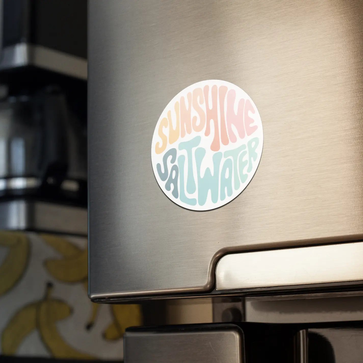 sunshine and saltwater magnet on fridge