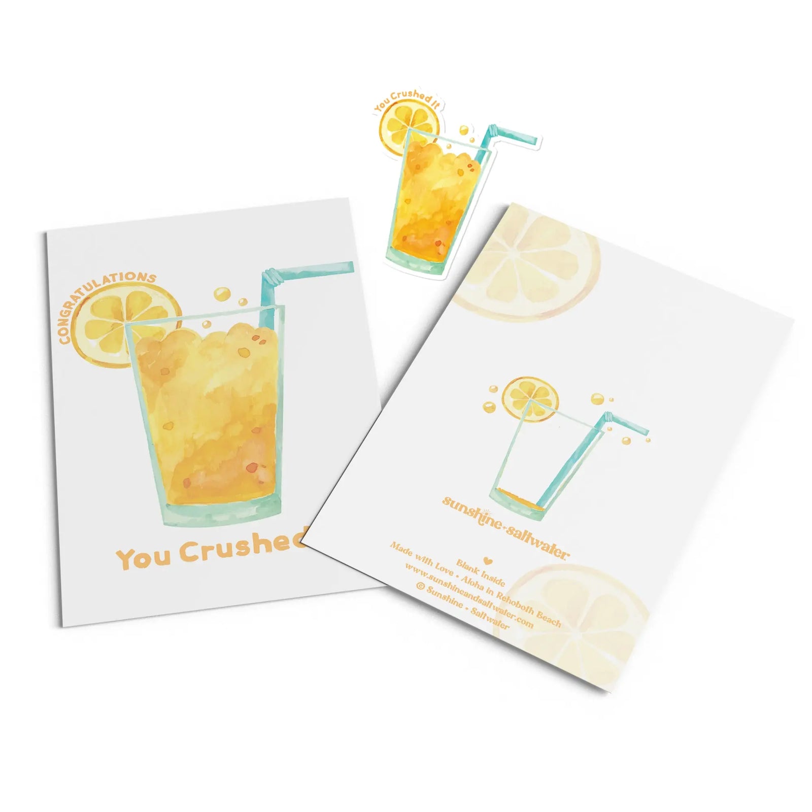 flat lay of congratulations-you crushed it greeting card featuring graphic of an orange crush drink
