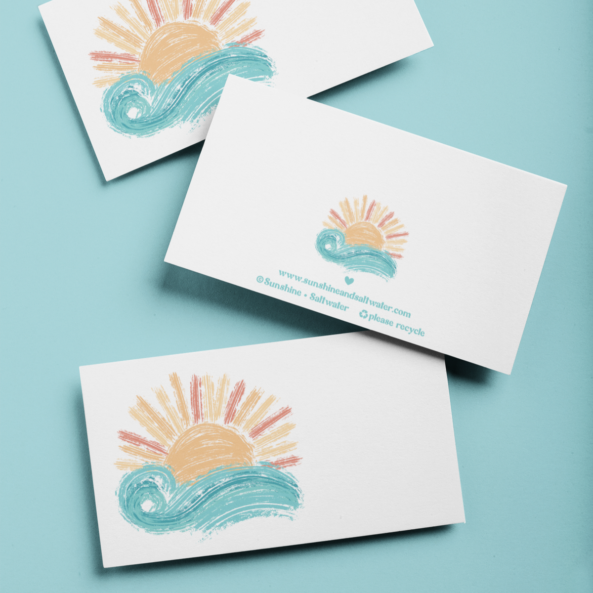 three itty bitty greeting cards with sunset over waves drawing