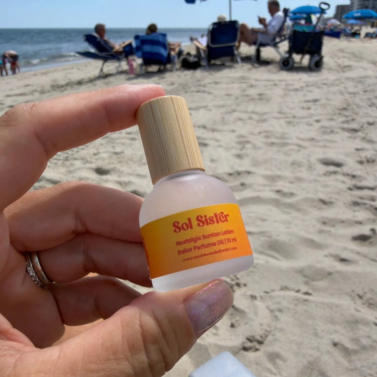 Sol Sister perfume rollerball with nostalgic suntan lotion fragrance