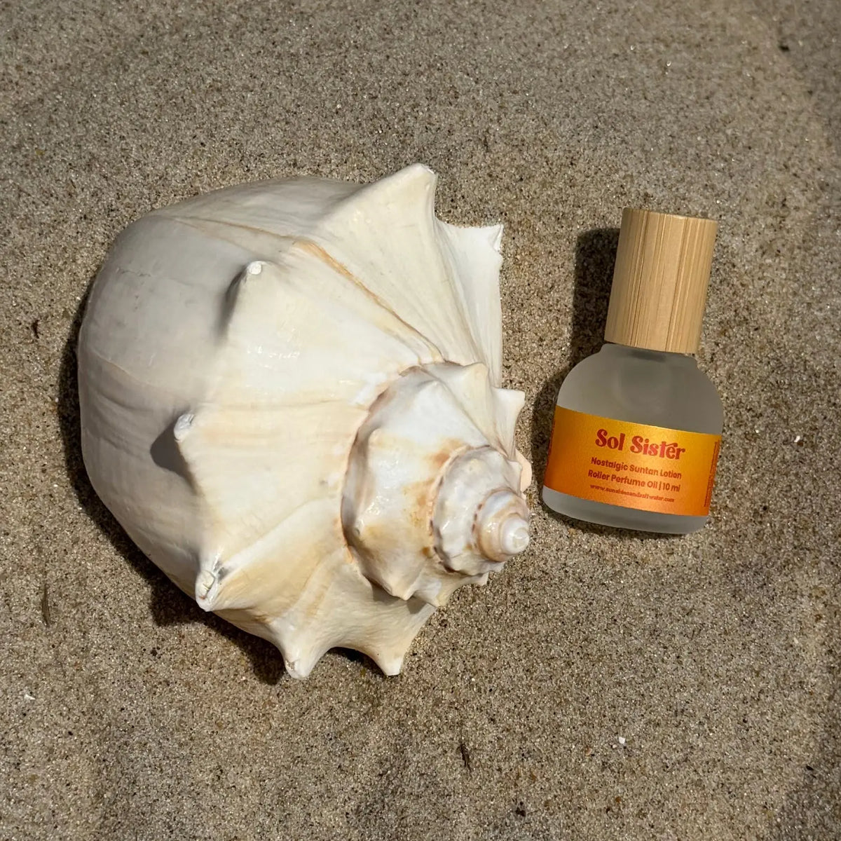 Sol Sister perfume rollerball with nostalgic suntan lotion fragrance
